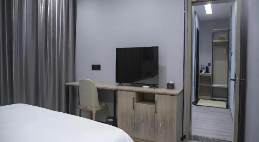 Bed in GreenTree Inn Anqing Tongcheng South Shengtang Road Shengtang International Business Hotel