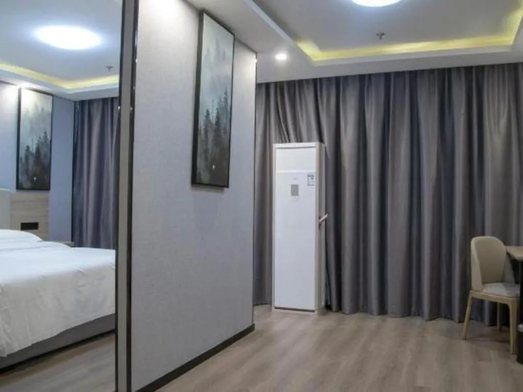 Bed in GreenTree Inn Anqing Tongcheng South Shengtang Road Shengtang International Business Hotel