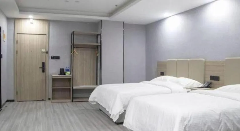 Bed in GreenTree Inn Anqing Tongcheng South Shengtang Road Shengtang International Business Hotel