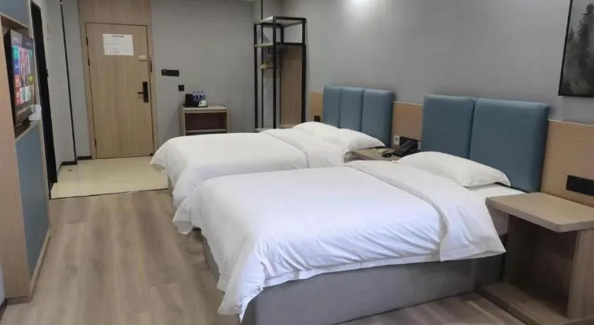 Bed in GreenTree Inn Anqing Tongcheng South Shengtang Road Shengtang International Business Hotel
