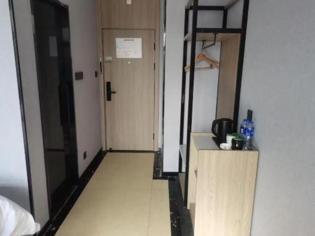 Bed in GreenTree Inn Anqing Tongcheng South Shengtang Road Shengtang International Business Hotel