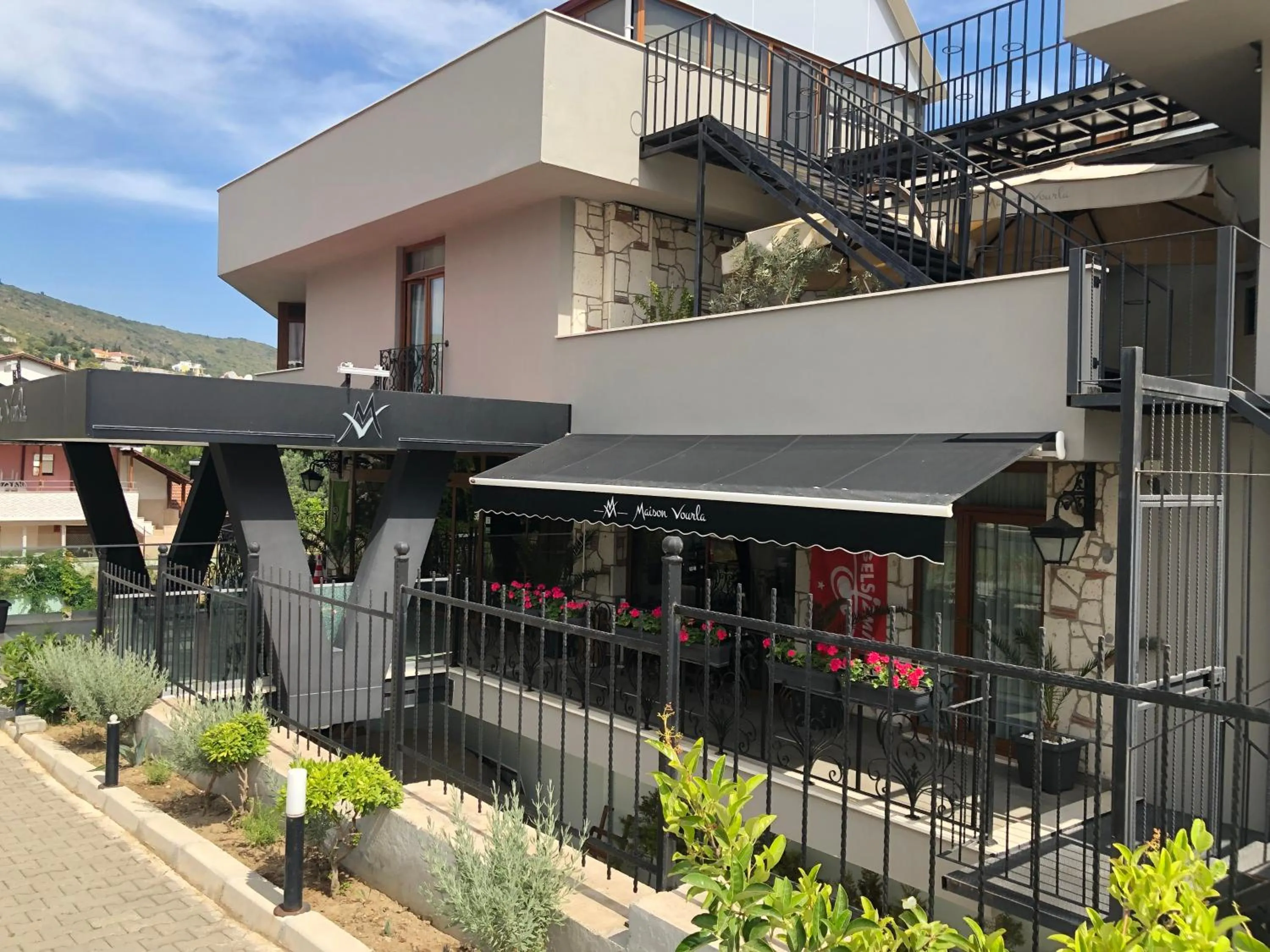 Facade/entrance in Maison Vourla Hotel
