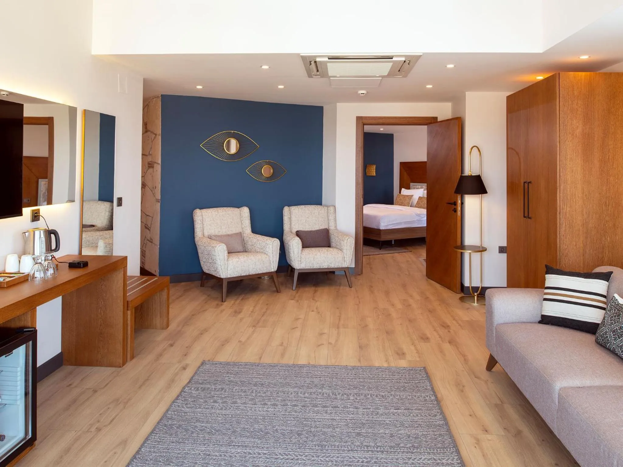 Seating area, Bed in Maison Vourla Hotel