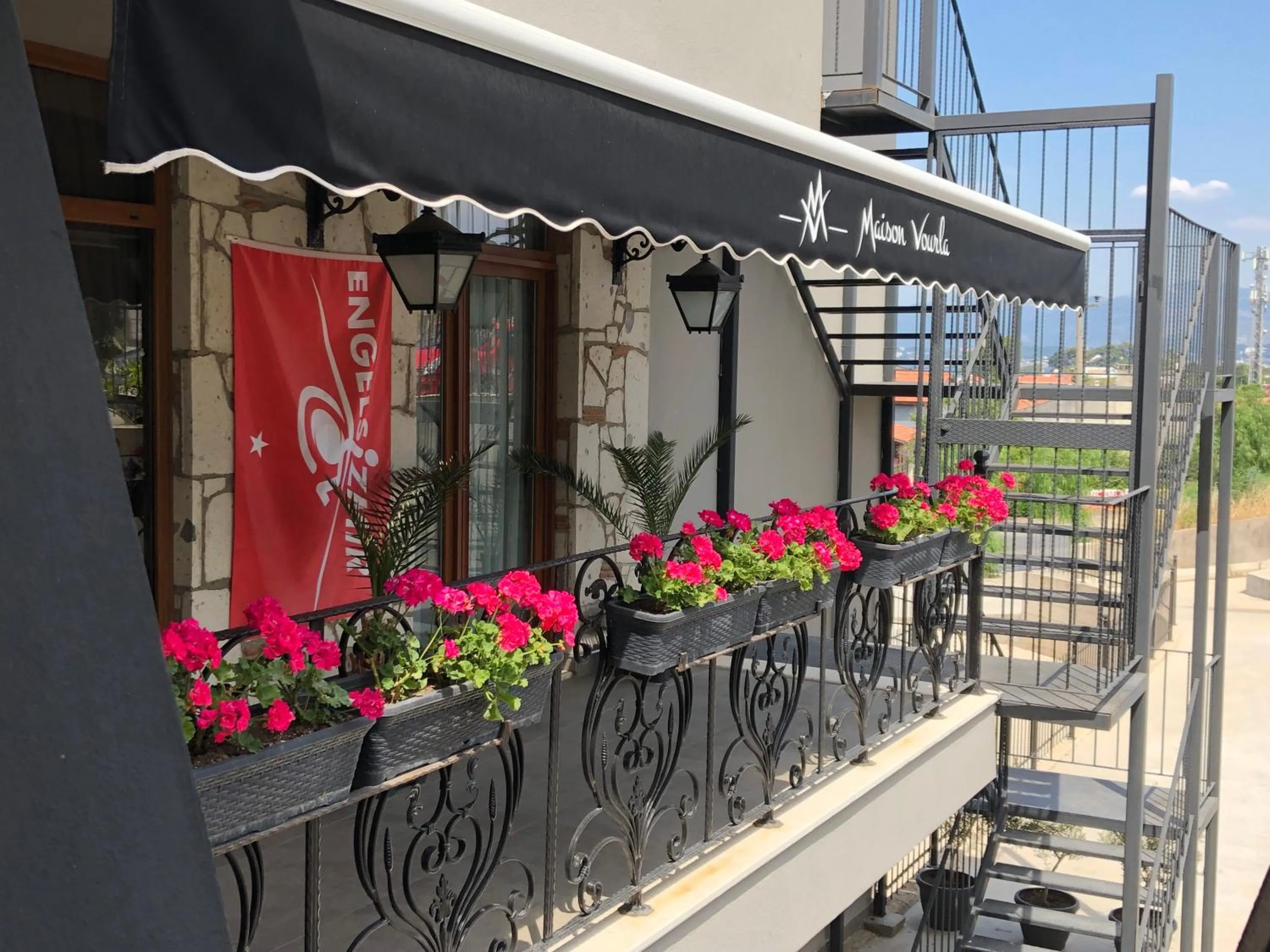 Facade/entrance in Maison Vourla Hotel
