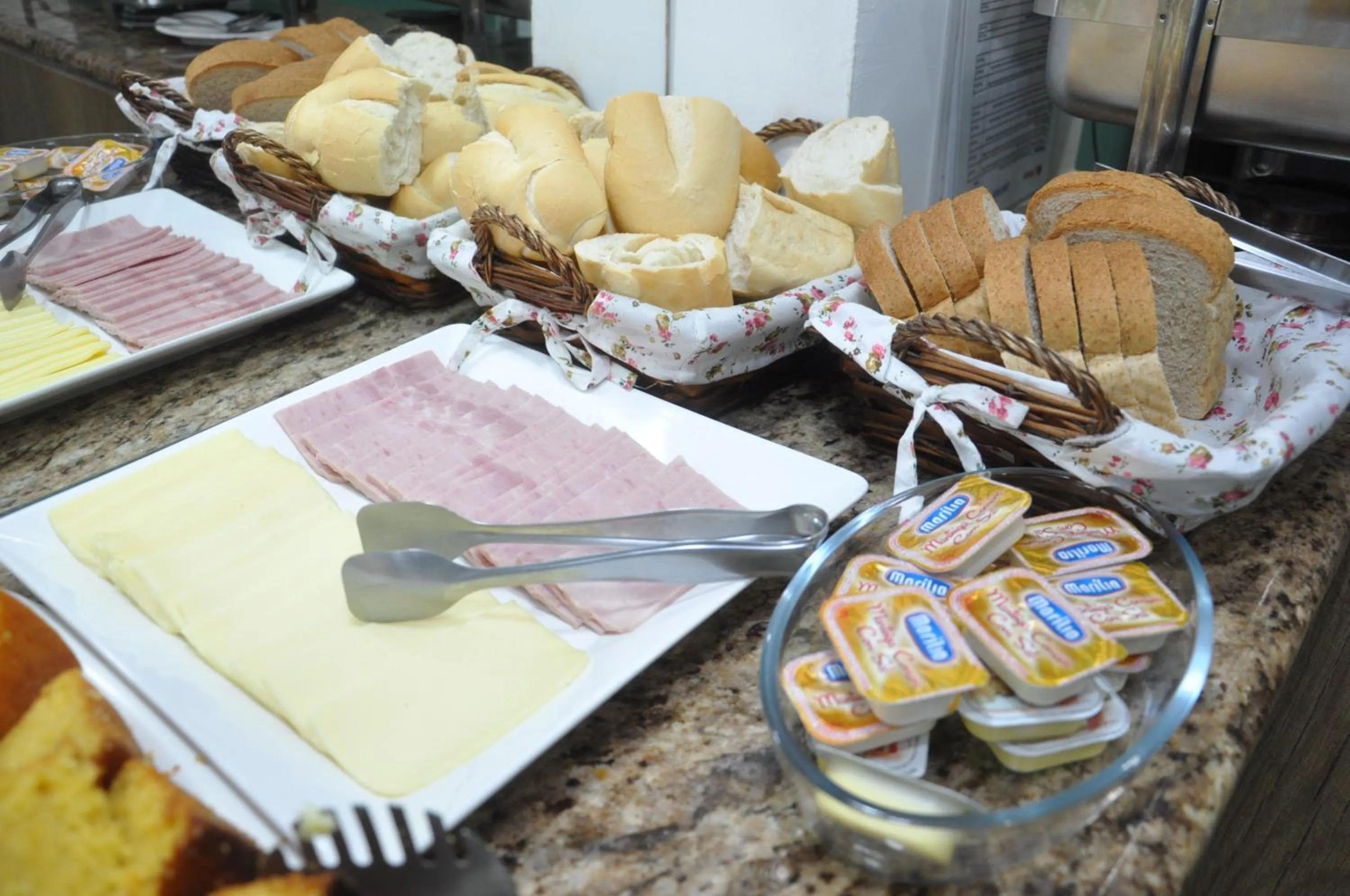 Buffet breakfast in Bonjour Hotel
