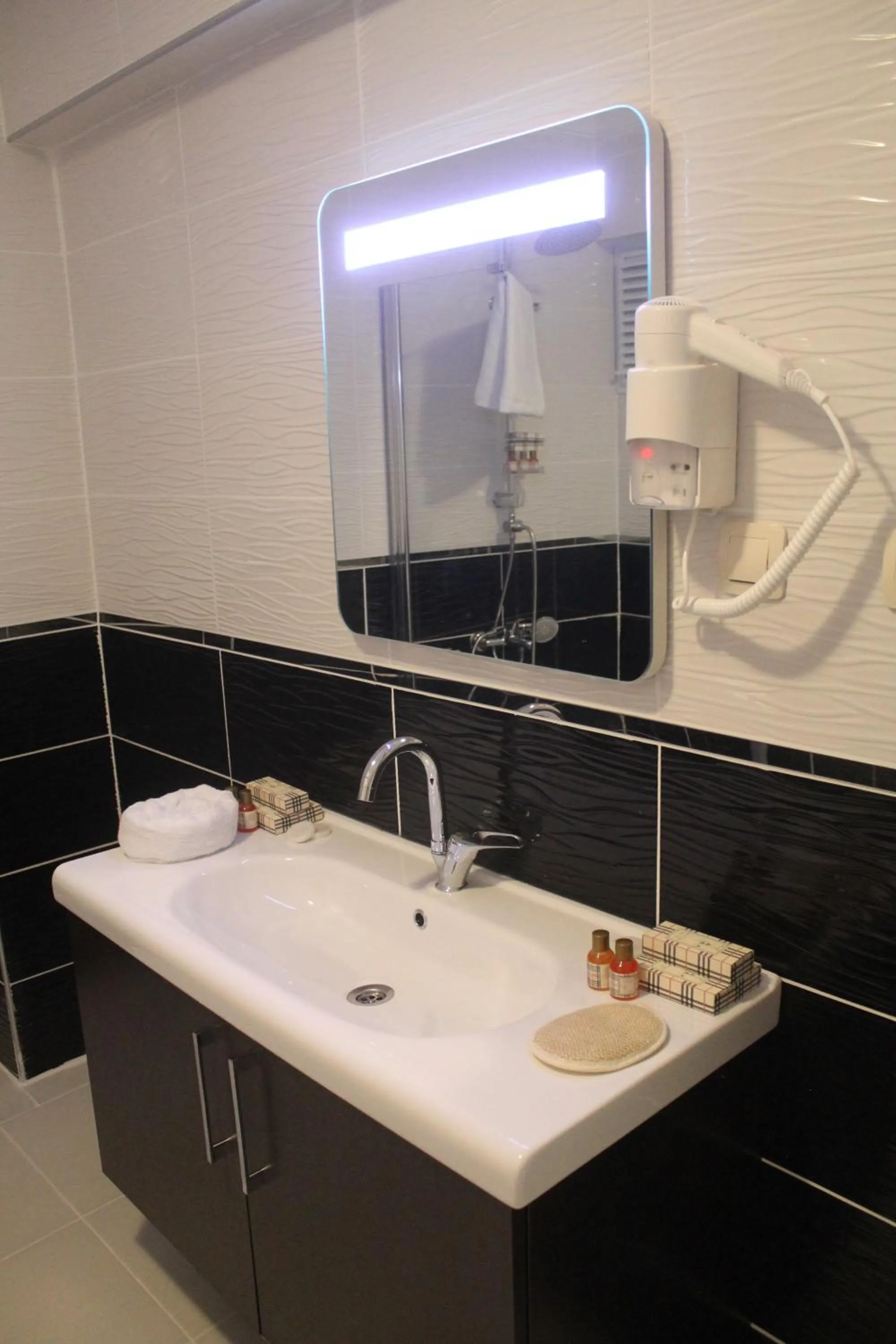 Bathroom in Lena Central Flats