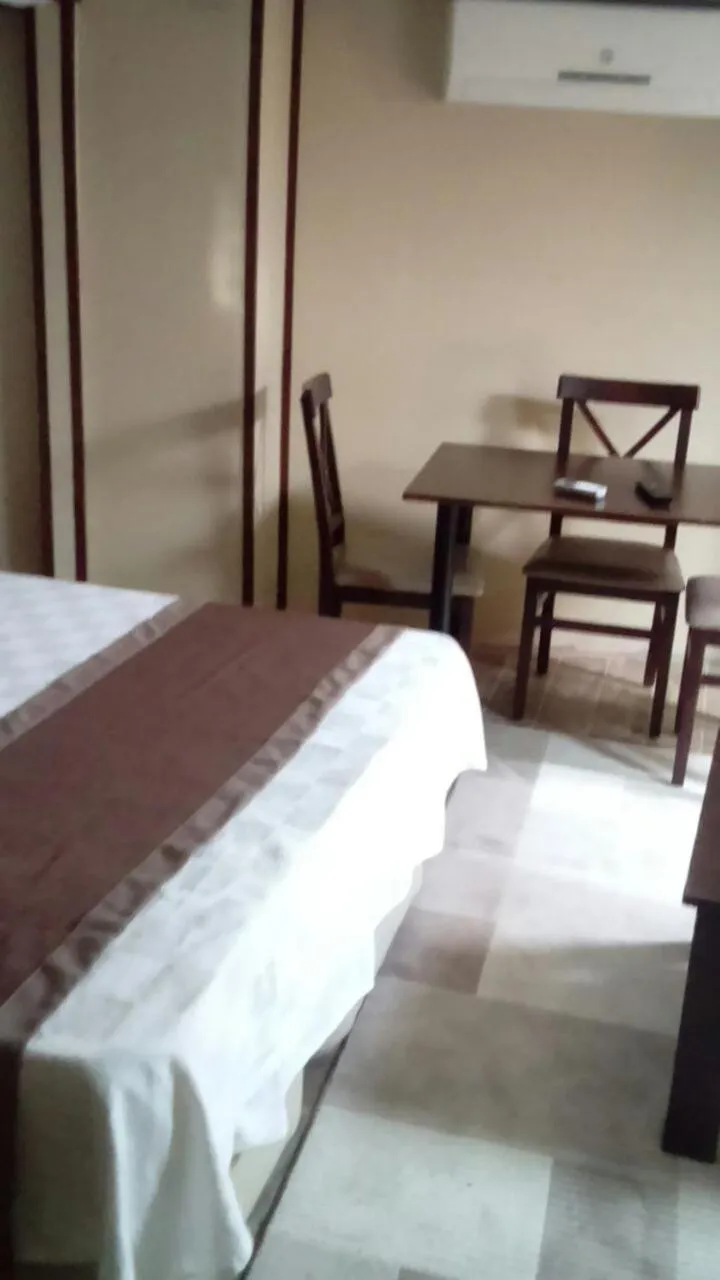 Bed in Lena Central Flats