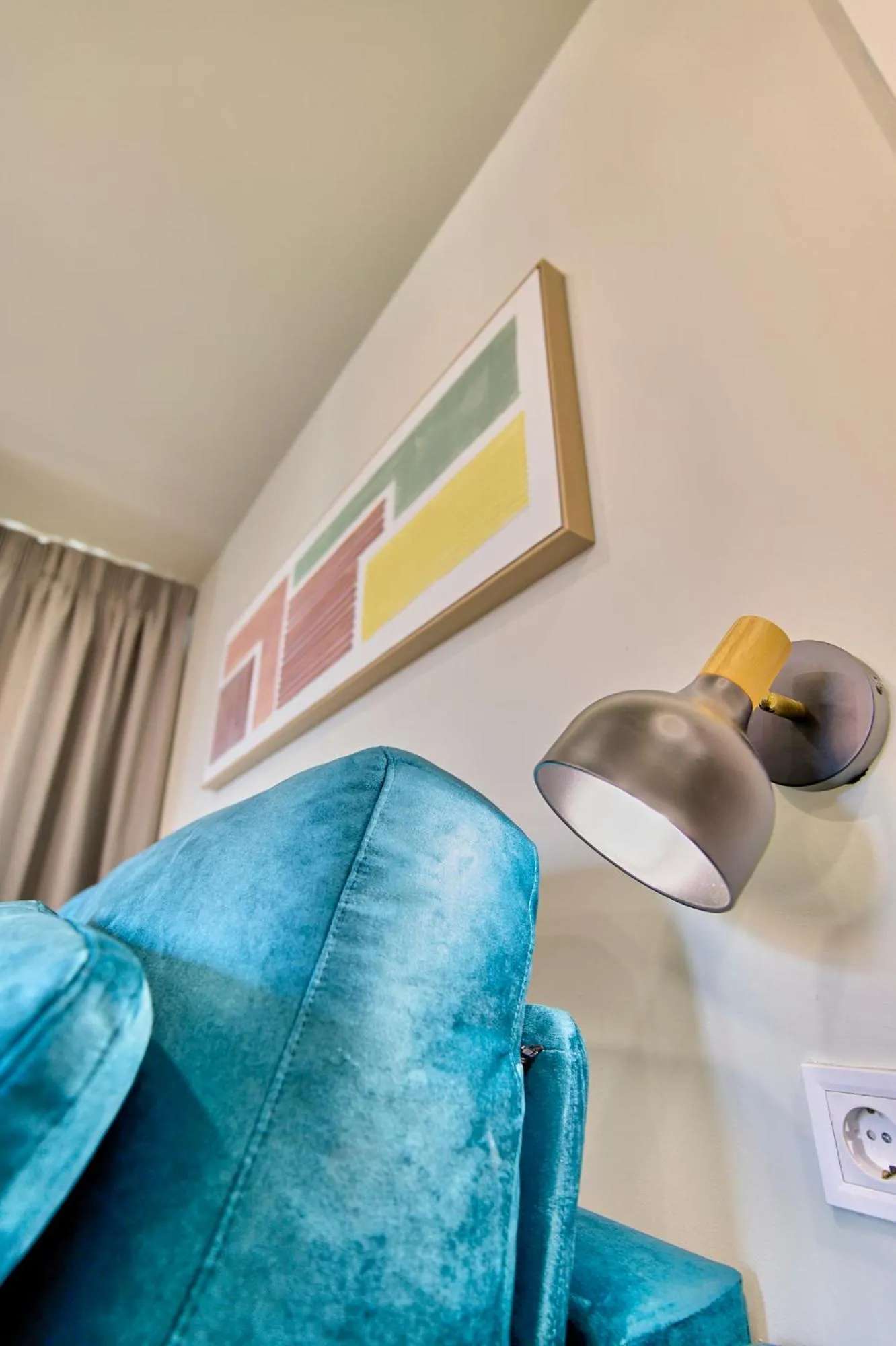 Living room in Apartamentos Olivia by gaiarooms