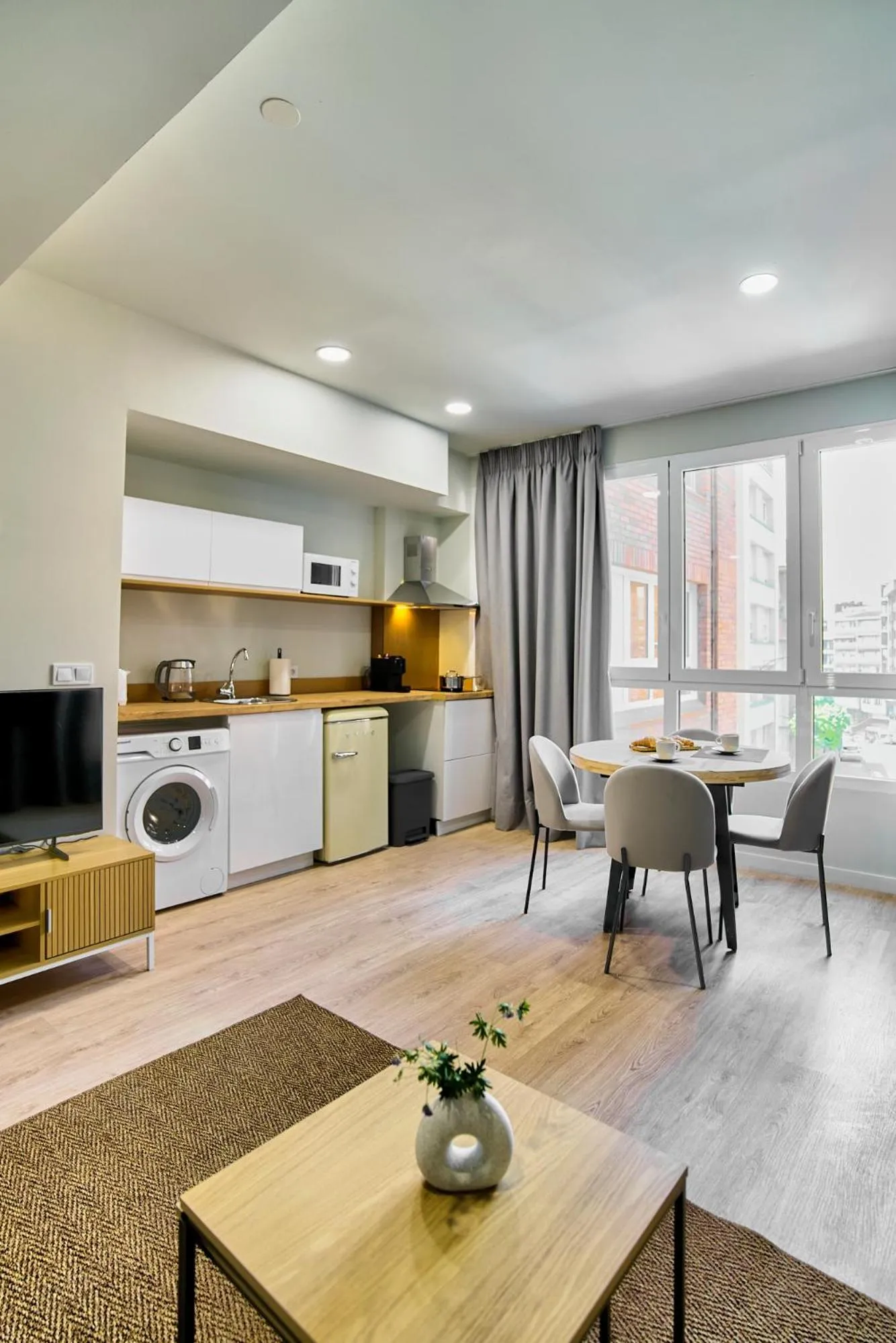 TV and multimedia in Apartamentos Olivia by gaiarooms