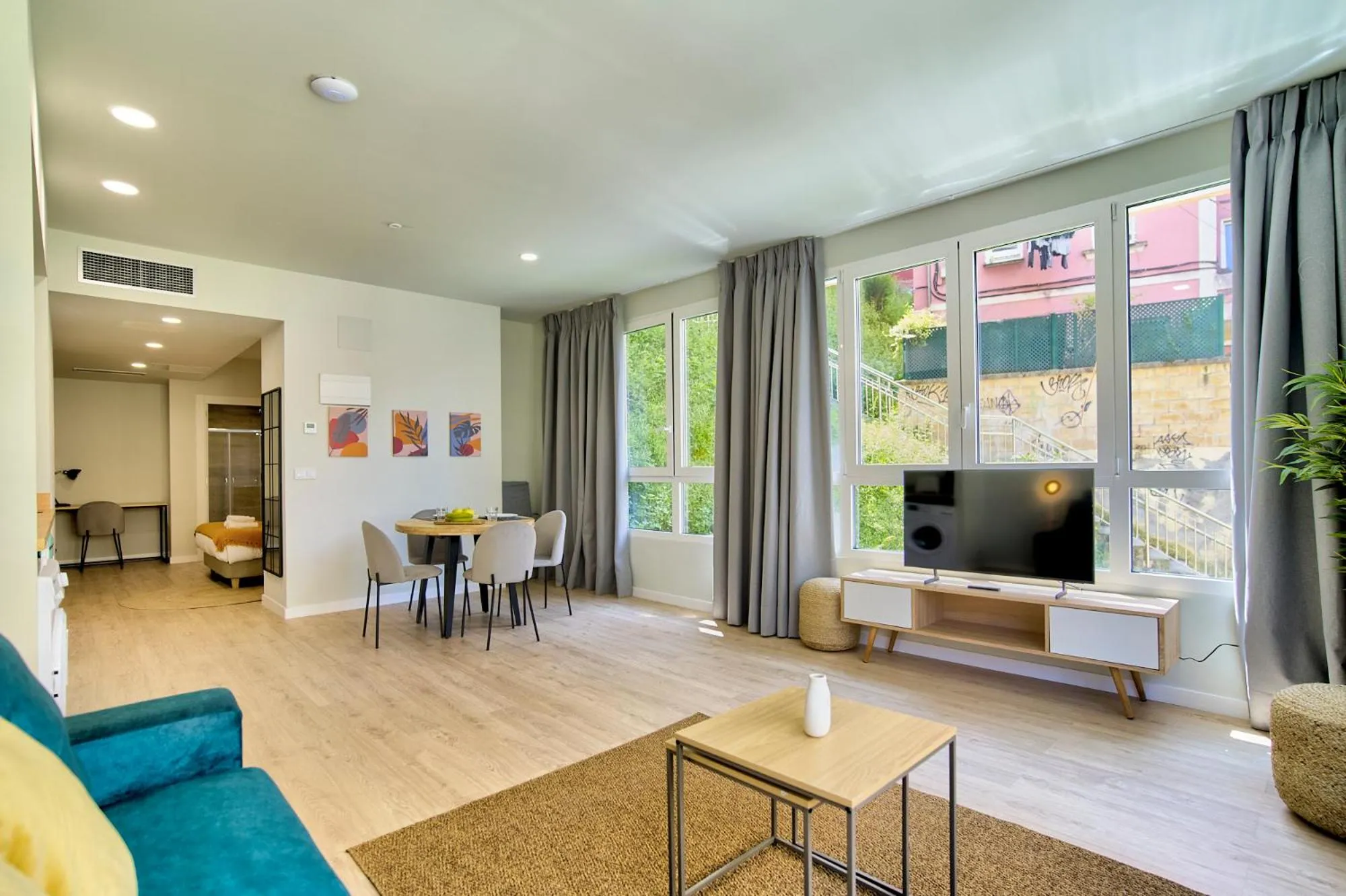 TV and multimedia in Apartamentos Olivia by gaiarooms