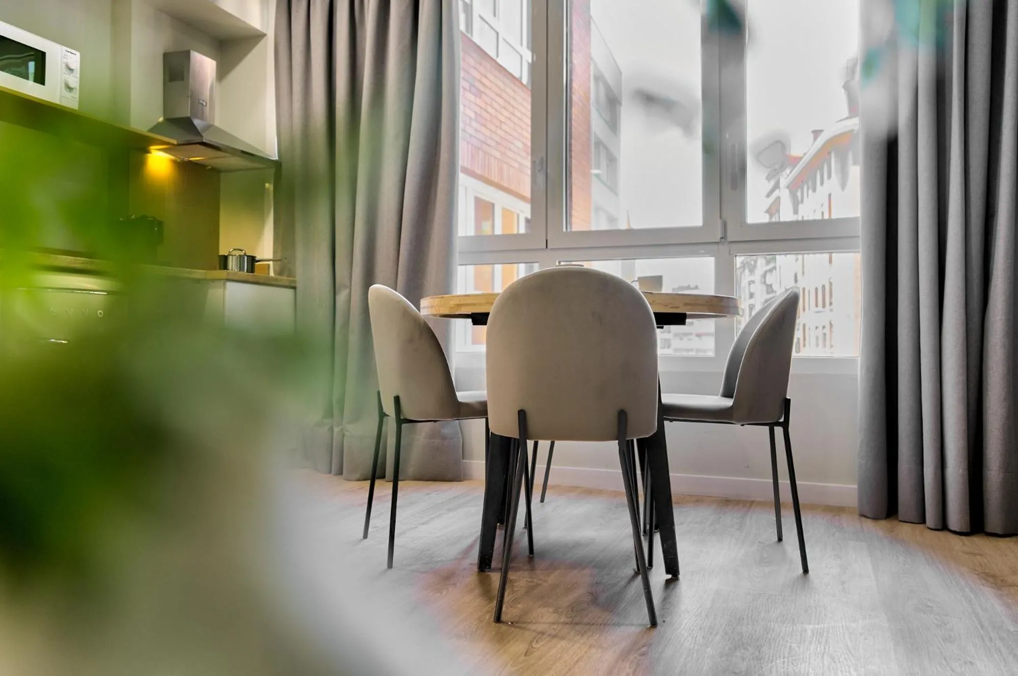 Dining area in Apartamentos Olivia by gaiarooms