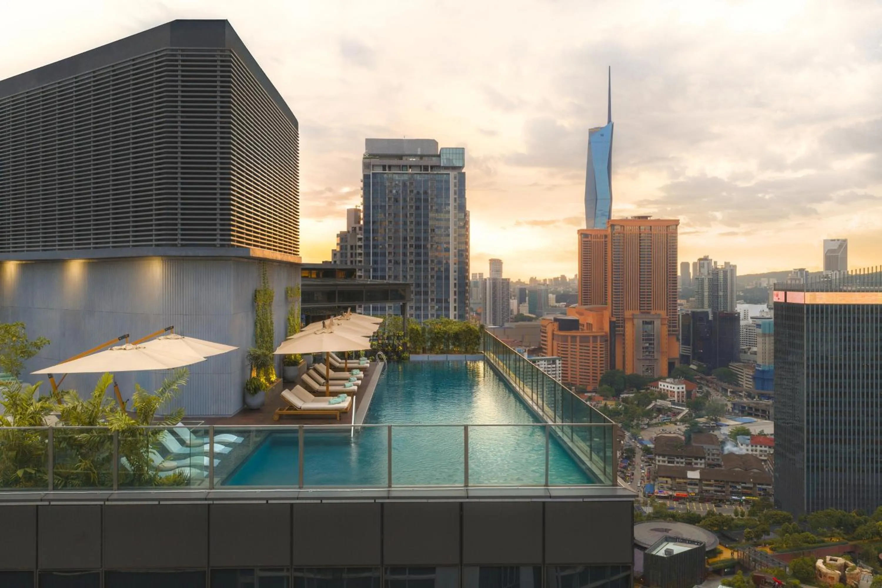 Swimming pool in Kimpton Naluria Kuala Lumpur by IHG