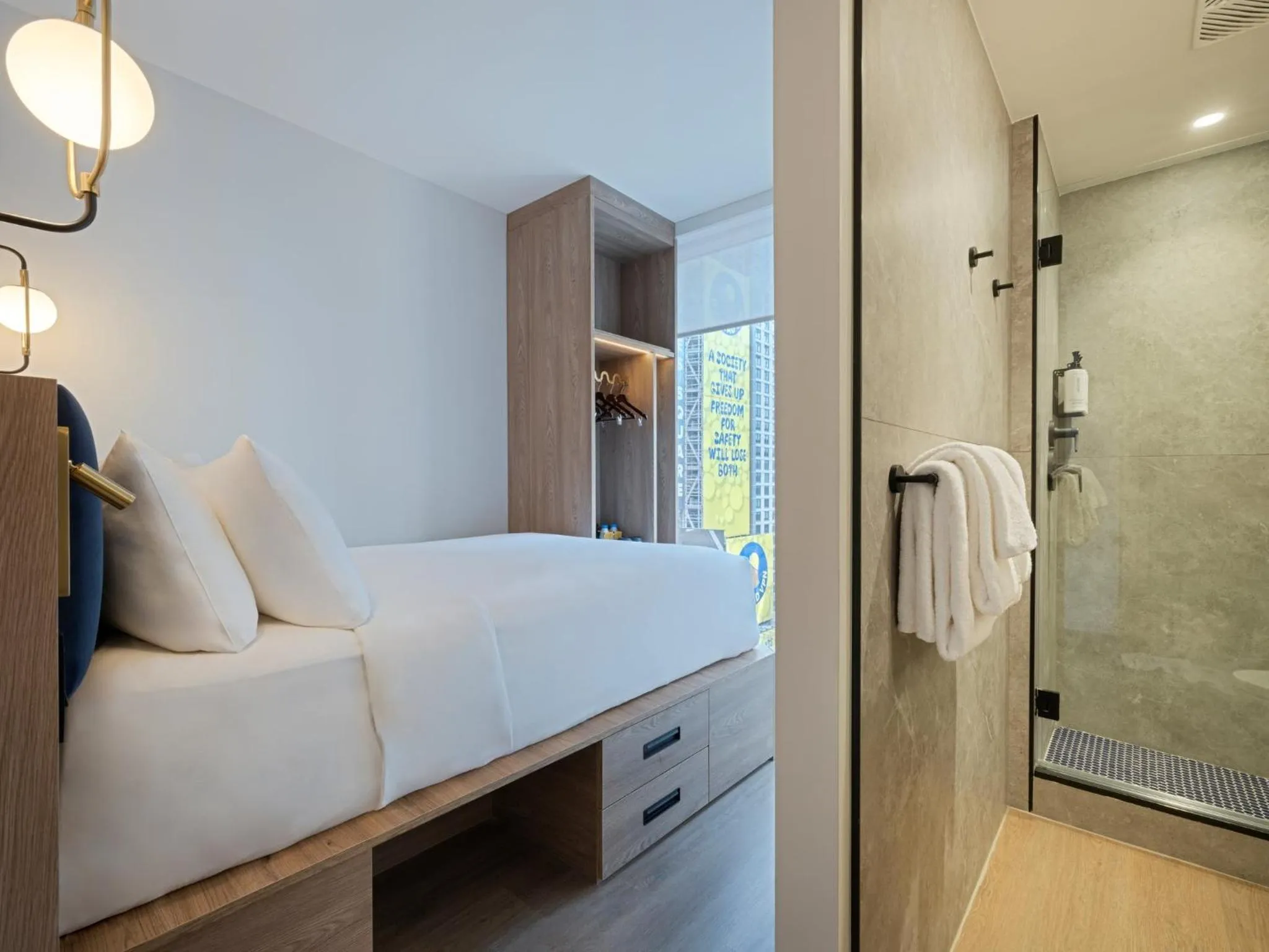 Photo of the whole room, Bed in voco Times Square - Broadway by IHG