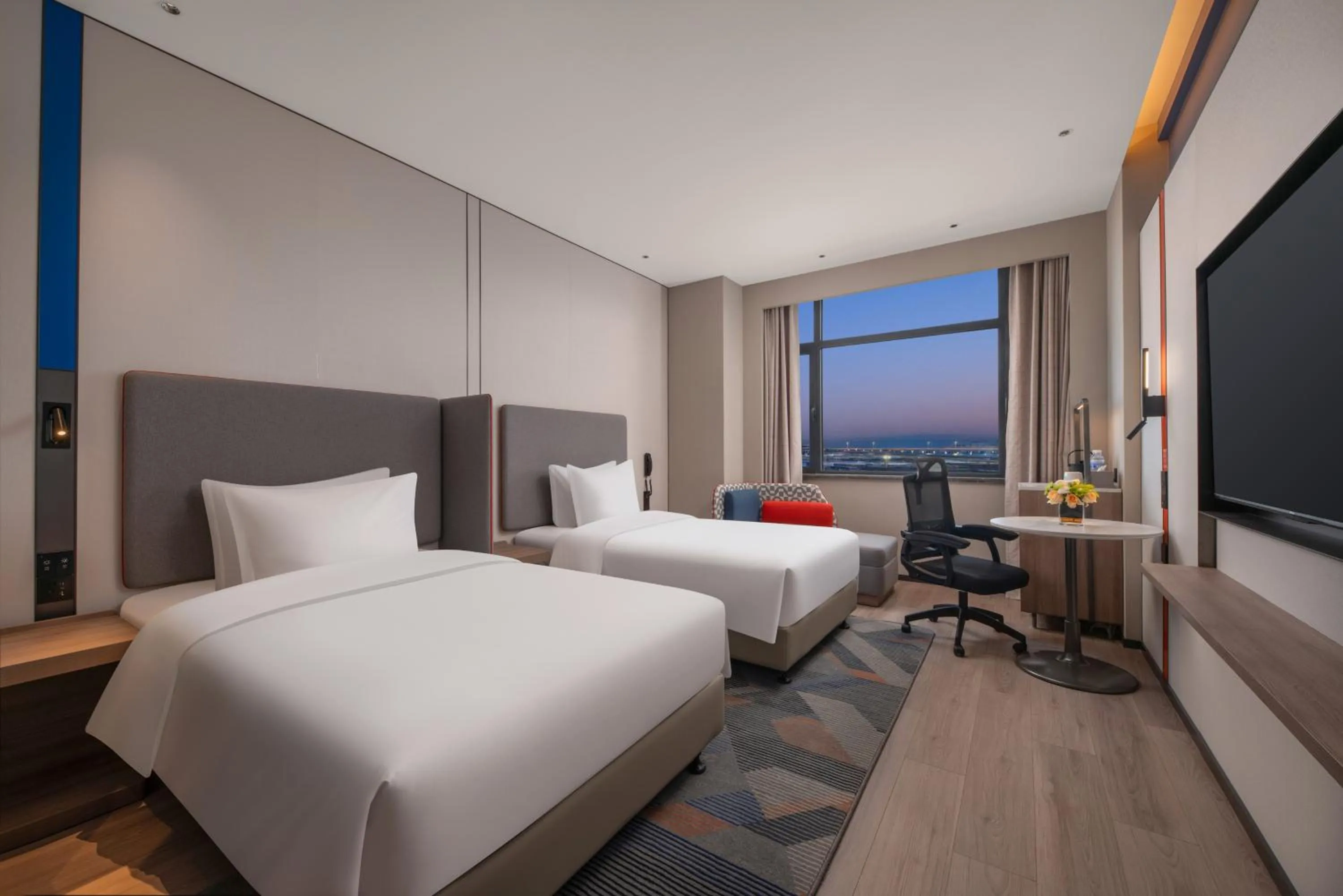 Bed in Holiday Inn Express Qingdao City Balcony by IHG