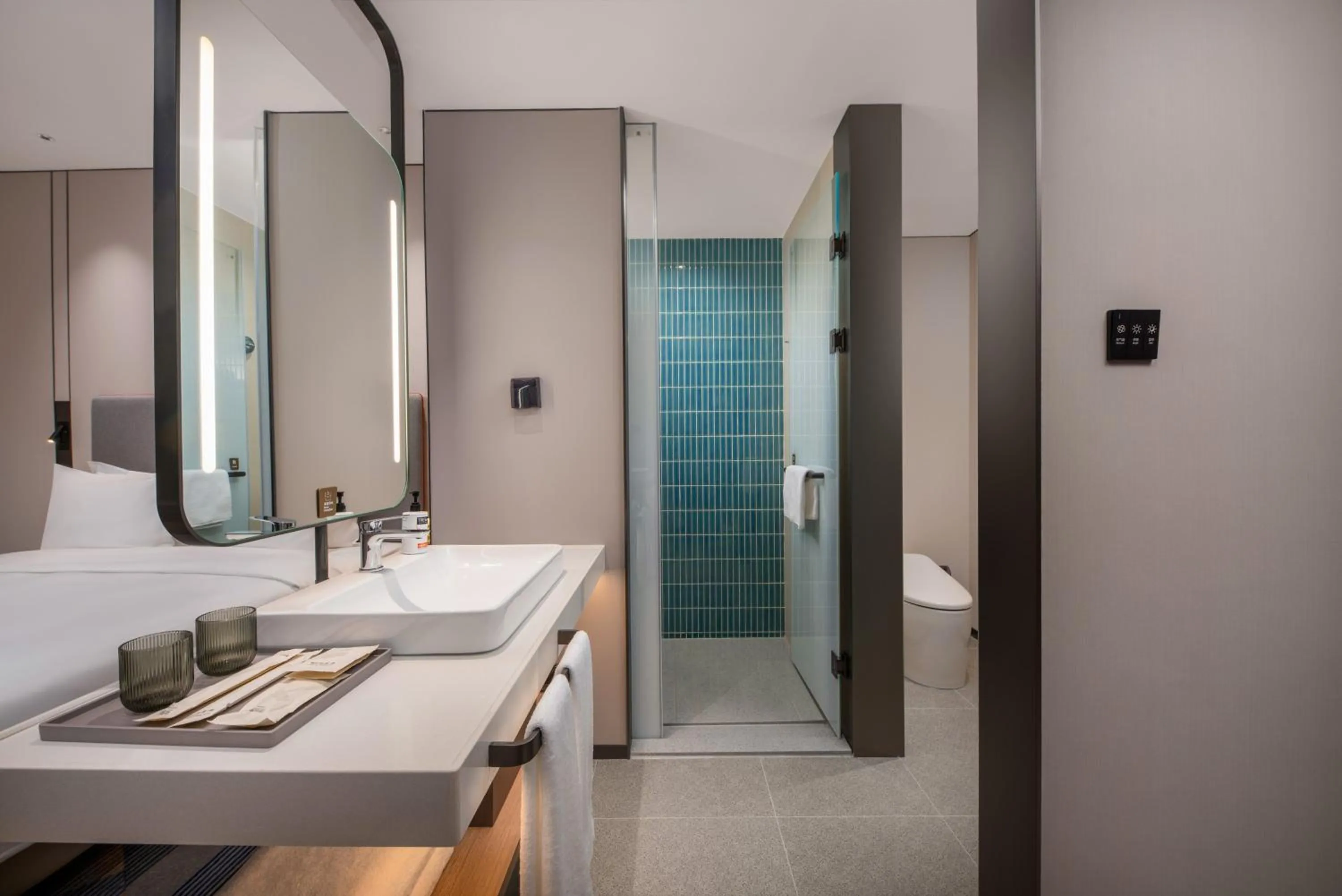 Photo of the whole room in Holiday Inn Express Qingdao City Balcony by IHG