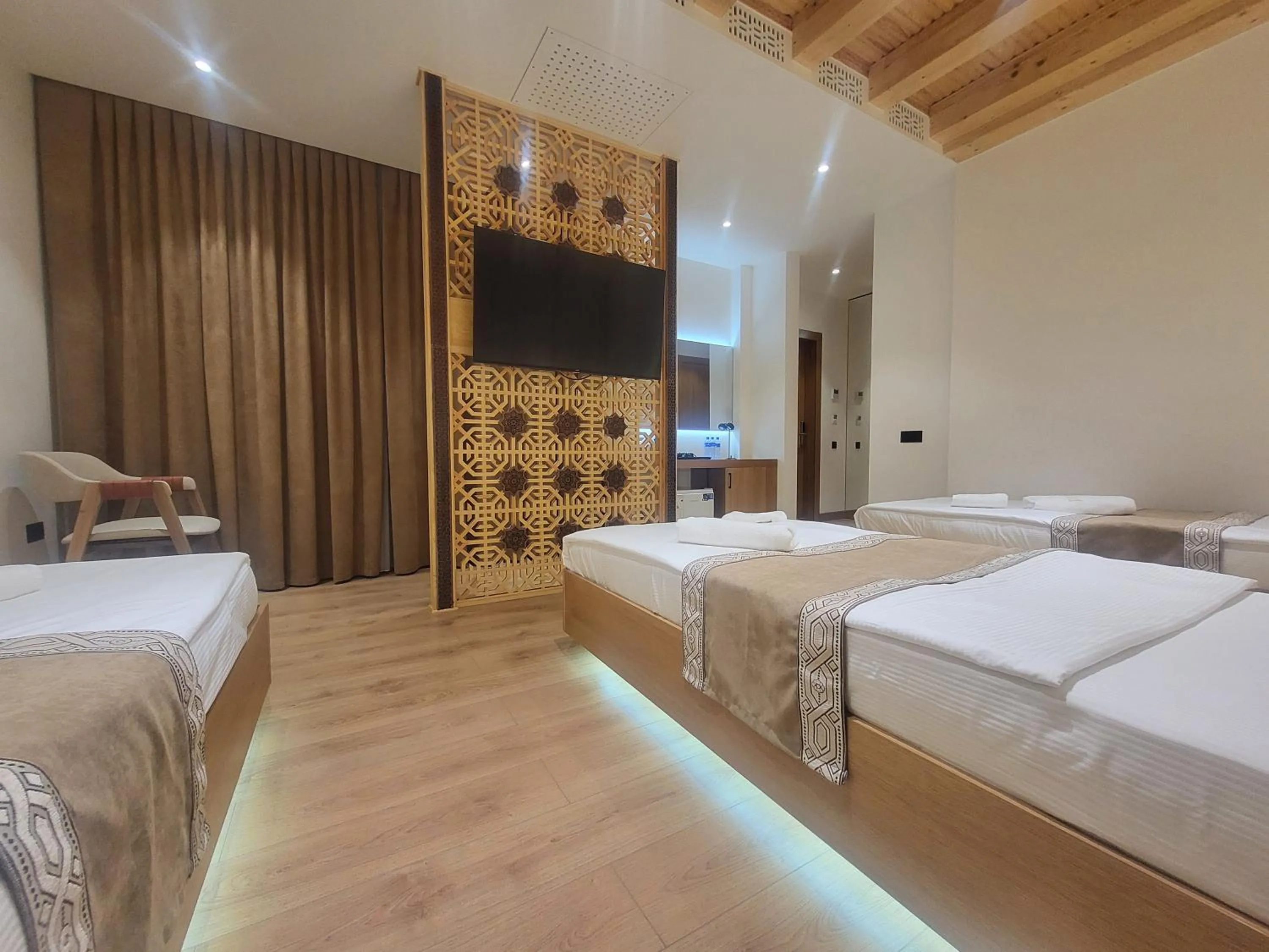 Photo of the whole room, Bed in Sarhad Hotel