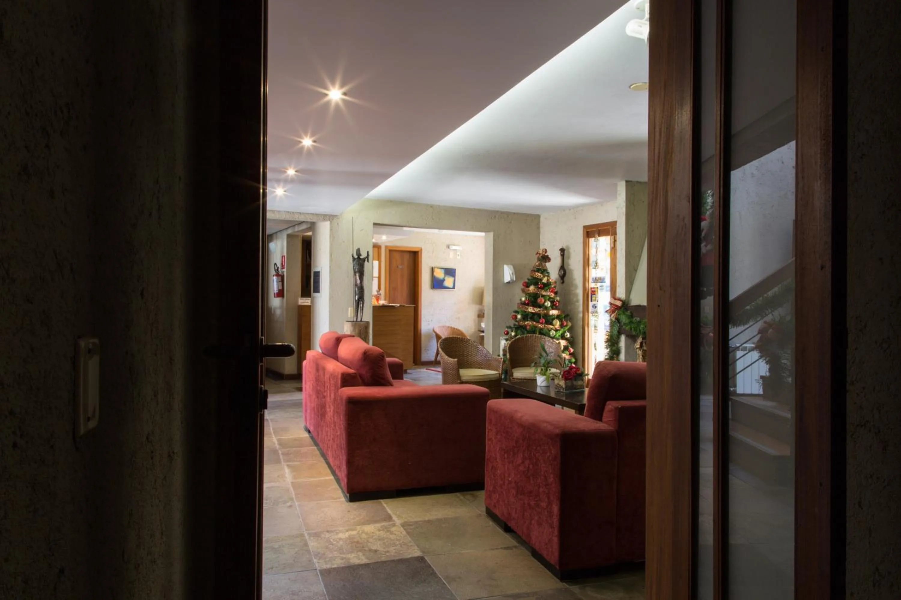 Communal lounge/ TV room in Estalagem Vila Suzana - Quadra de Beach Tennis Indoor