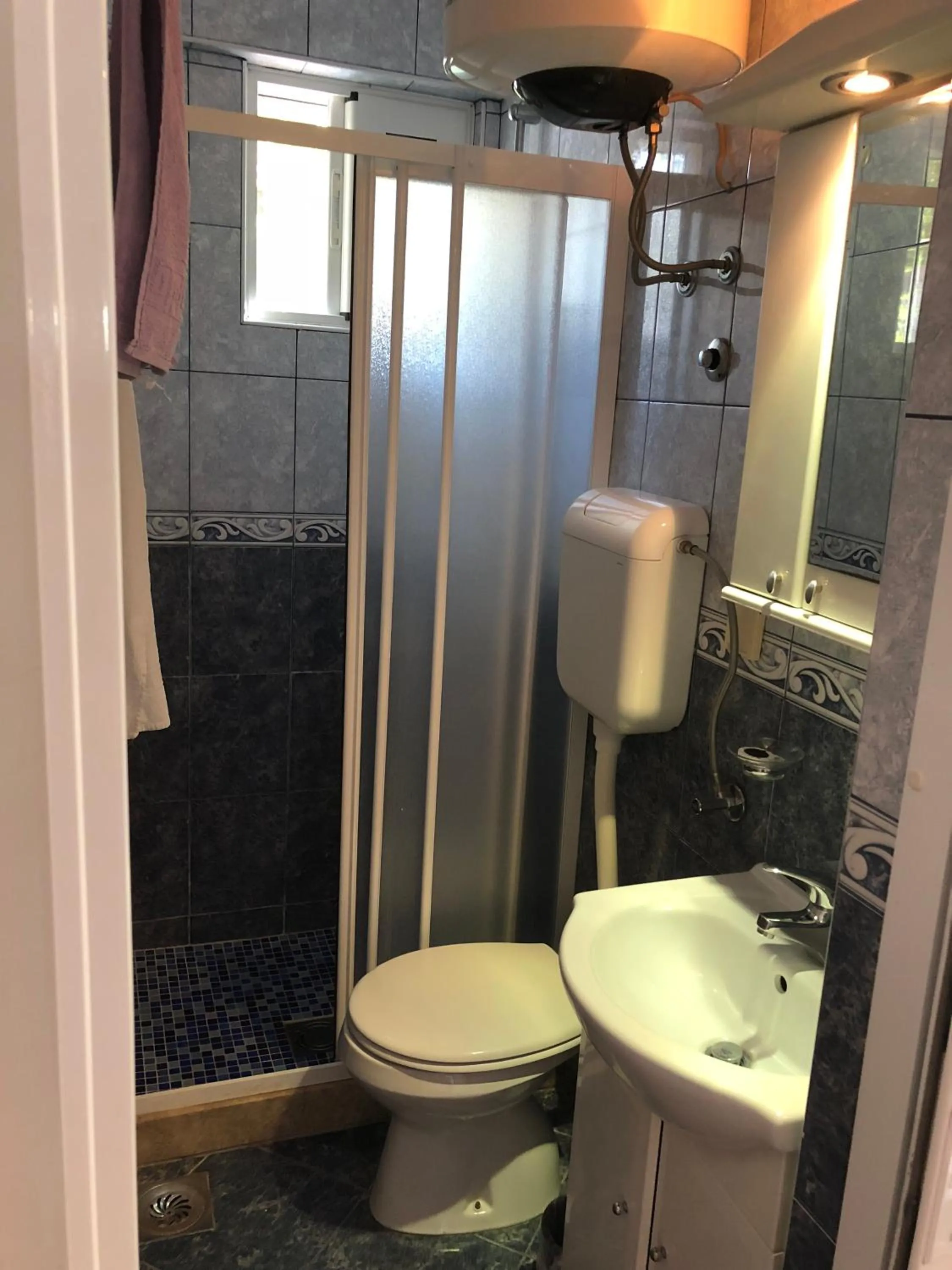 Bathroom in Apartments Sveti Stefan MNE