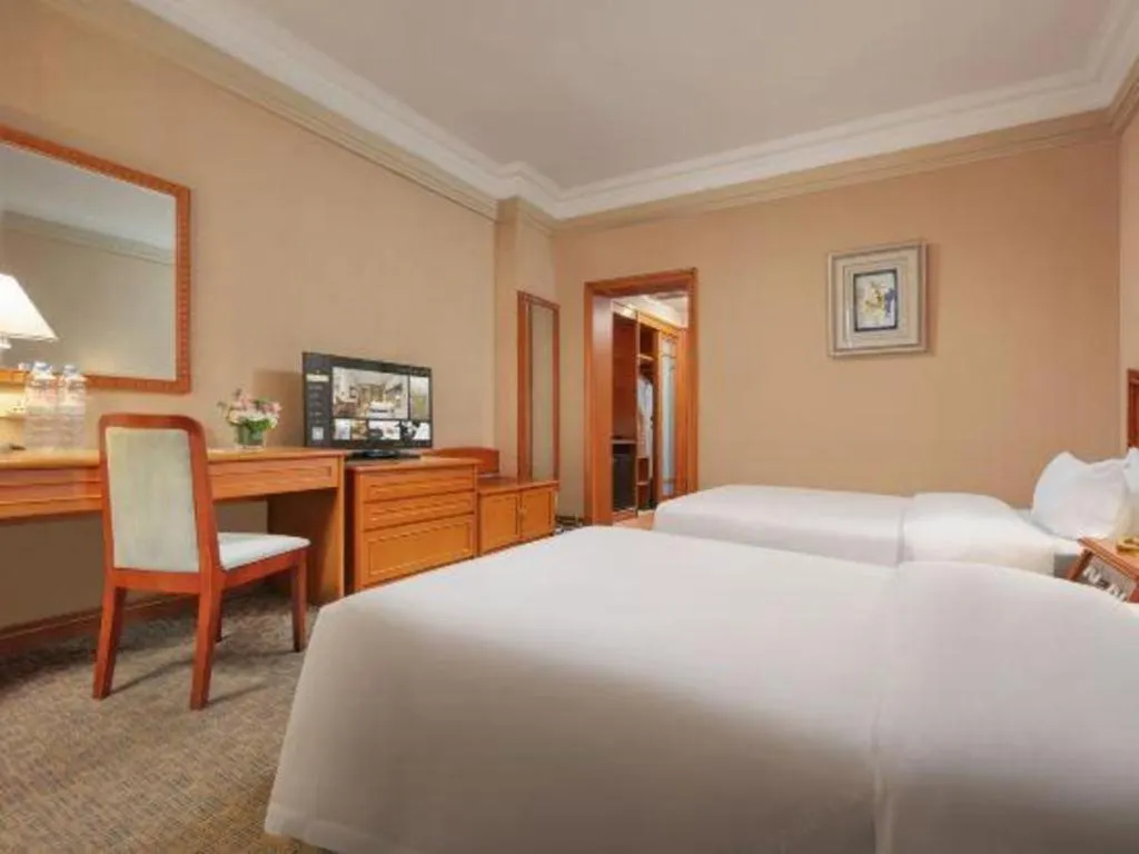 Bed in Haihua Hotel Hangzhou