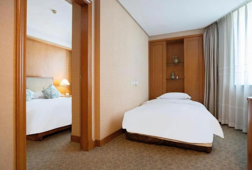 Bed in Haihua Hotel Hangzhou