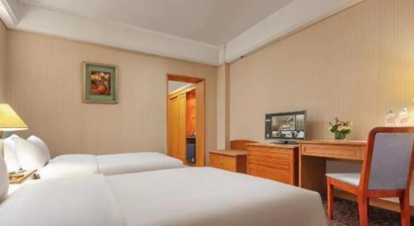 Bed in Haihua Hotel Hangzhou