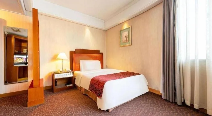 Bed in Haihua Hotel Hangzhou