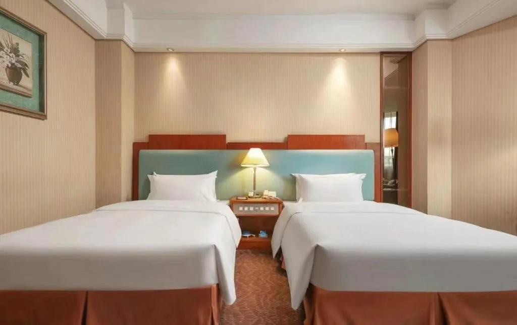 Bed in Haihua Hotel Hangzhou