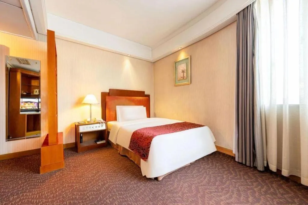 Bed in Haihua Hotel Hangzhou