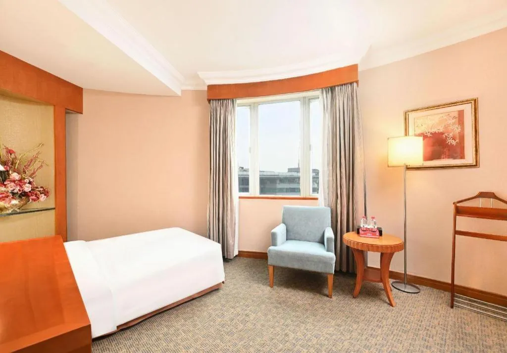 Bed in Haihua Hotel Hangzhou