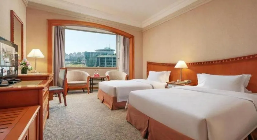 Bed in Haihua Hotel Hangzhou