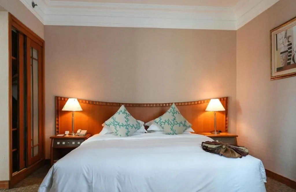 Bed in Haihua Hotel Hangzhou