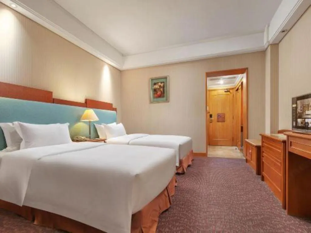 Bed in Haihua Hotel Hangzhou