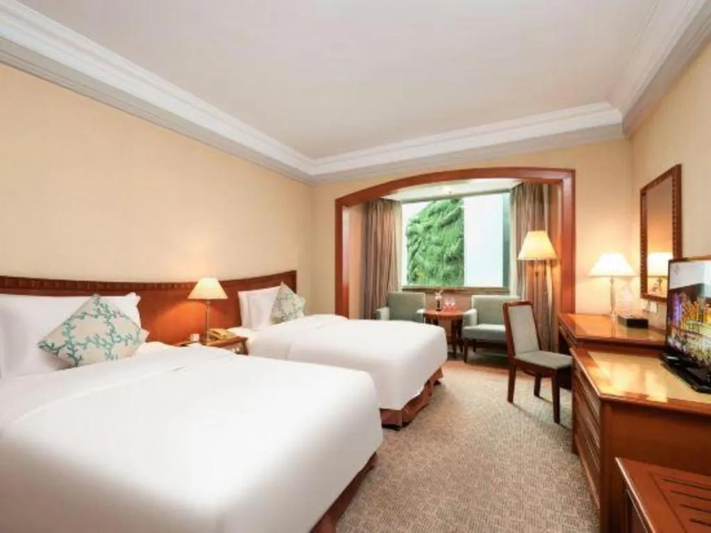 Bed in Haihua Hotel Hangzhou