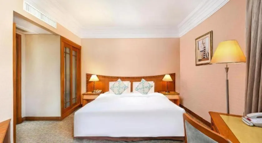 Bed in Haihua Hotel Hangzhou