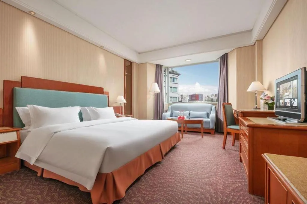 Bed in Haihua Hotel Hangzhou