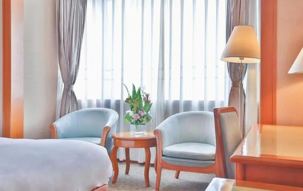 Bed in Haihua Hotel Hangzhou