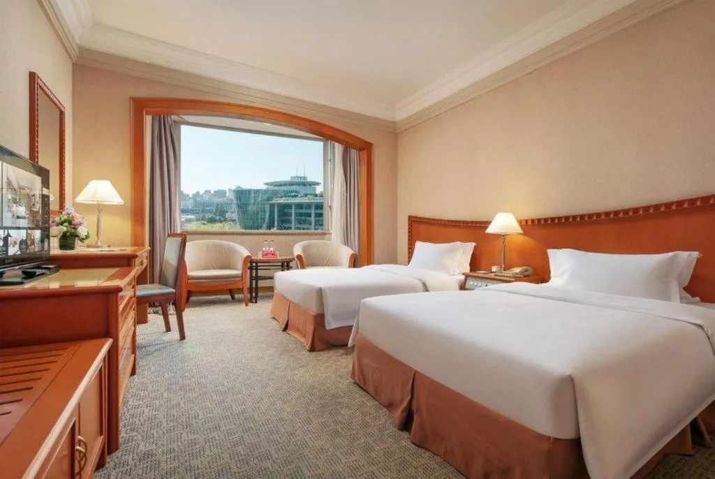 Bed in Haihua Hotel Hangzhou