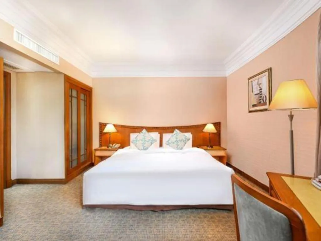 Bed in Haihua Hotel Hangzhou