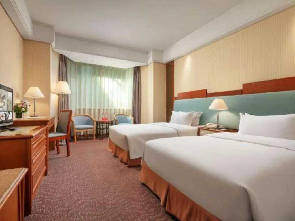 Bed in Haihua Hotel Hangzhou