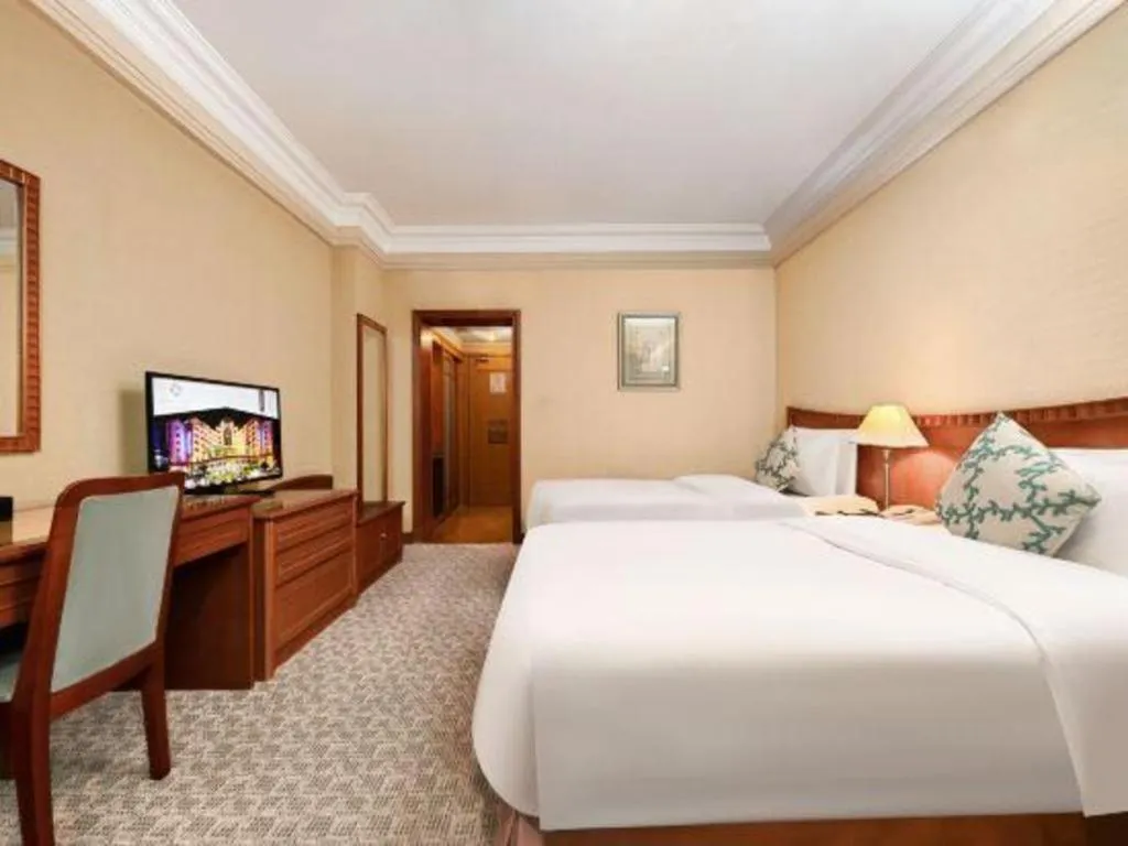 Bed in Haihua Hotel Hangzhou