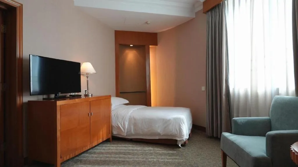 Bed in Haihua Hotel Hangzhou