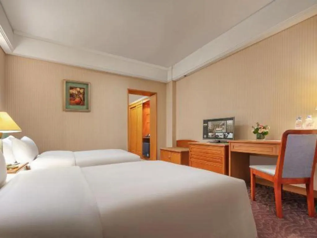 Bed in Haihua Hotel Hangzhou