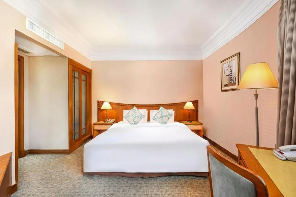 Bed in Haihua Hotel Hangzhou