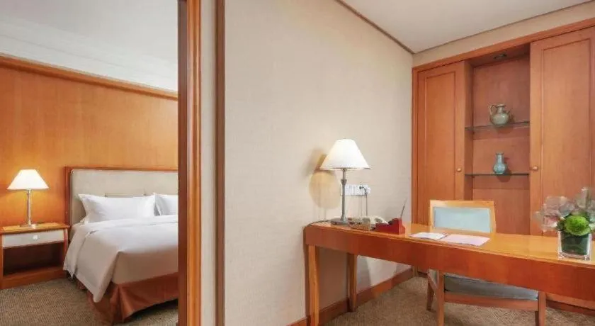 Bed in Haihua Hotel Hangzhou