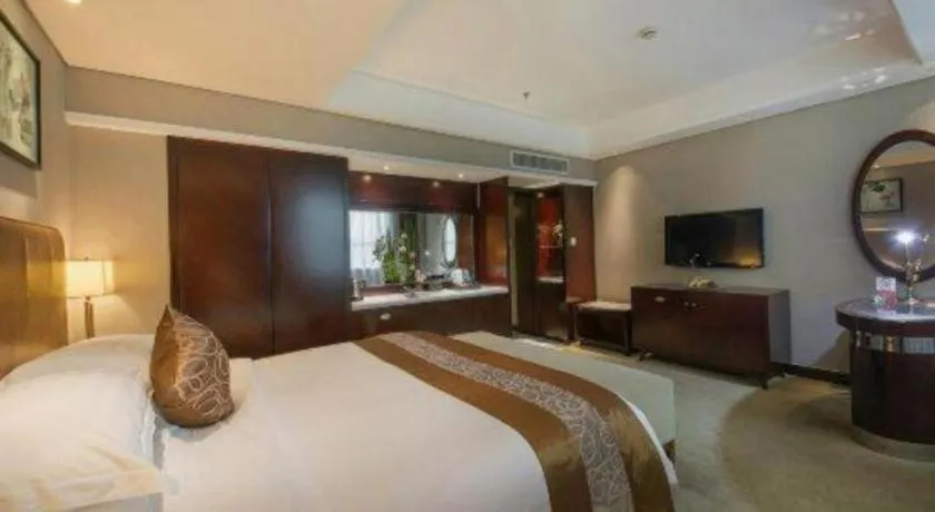 Bed in Maison New Century Hotel Ningbo