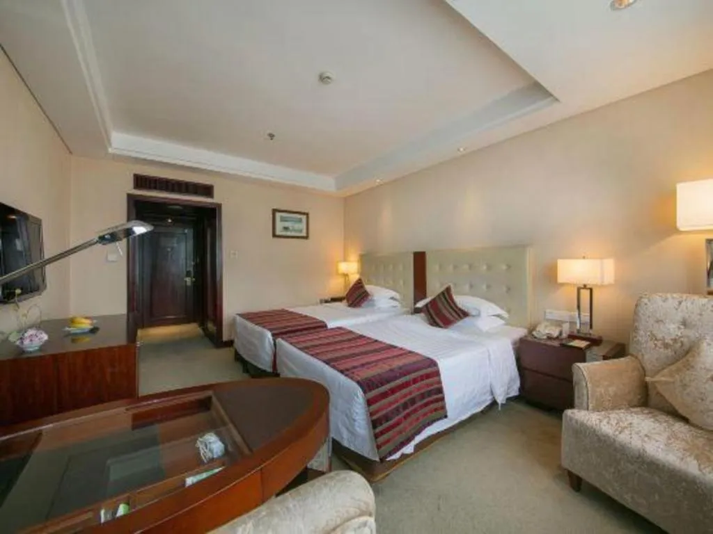 Bed in Maison New Century Hotel Ningbo