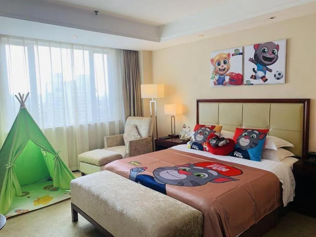 Bed in Maison New Century Hotel Ningbo