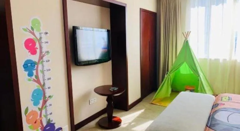 Bed in Maison New Century Hotel Ningbo