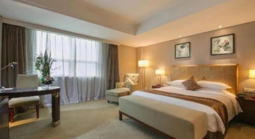 Bed in Maison New Century Hotel Ningbo