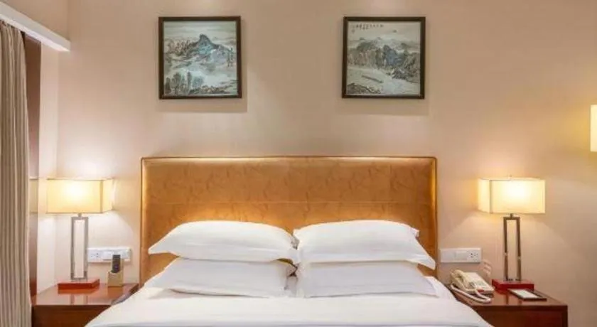 Bed in Maison New Century Hotel Ningbo